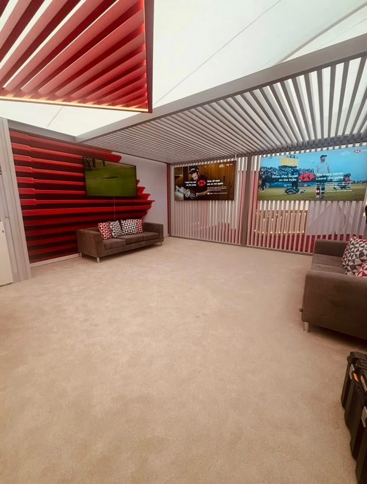 HSBC hospitality suite at The Open Championship - bespoke slat ceiling, joinery, and finishes by MG Fit-Out